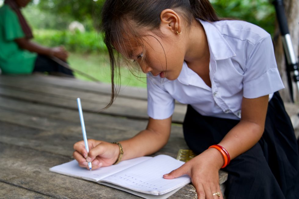 Sreyka writes in her workbook that her sponsor provided for her.